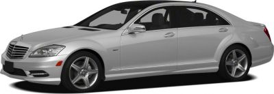 Side profile of a luxury sedan with alloy wheels and sleek design.