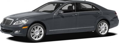 Luxury sedan front side profile with alloy wheels