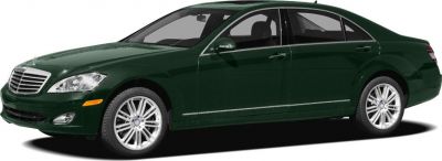 Luxury sedan with chrome grille and multi-spoke alloy wheels