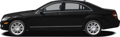 Side profile of luxury sedan with alloy wheels and long wheelbase