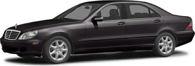 Side profile of a luxury sedan with clean lines and alloy wheels