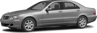 Silver sedan side profile with alloy wheels and smooth body lines