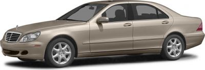 Side profile of a luxury elongated sedan with alloy wheels and tinted windows