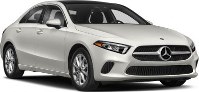 Front side with sleek headlights and grille of a compact luxury sedan