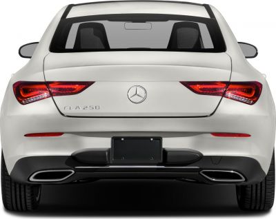 Rear view with LED tail lights and dual exhaust outlets