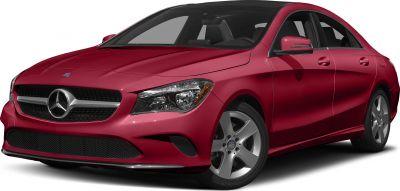 Red sporty compact coupe showing front grille and alloy wheels