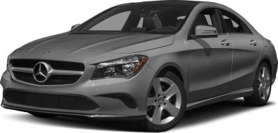 Front grille and headlight detail of a luxury coupe