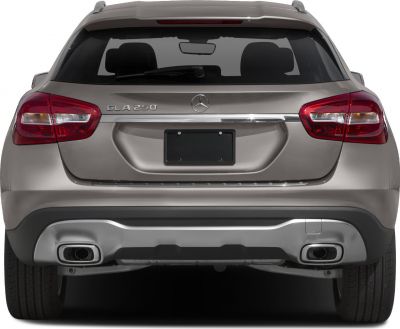 SUV rear design with dual exhausts, LED taillights, and roof spoiler.