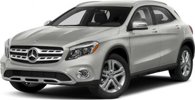 Front view with distinctive grille and headlights of a silver SUV
