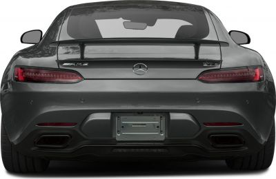 Rear spoiler, sleek LED tail lights, dual exhausts on sport coupe rear