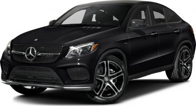 Front side view of luxury SUV with coupe styling and modern rims.