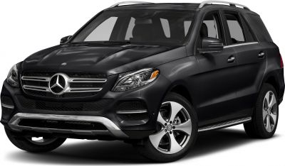 Front grille and headlight with alloy wheels of a matte black SUV