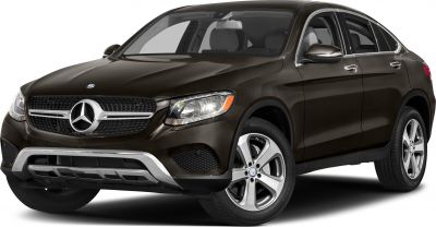 Front view of a sleek SUV with LED headlights and distinctive grille design.