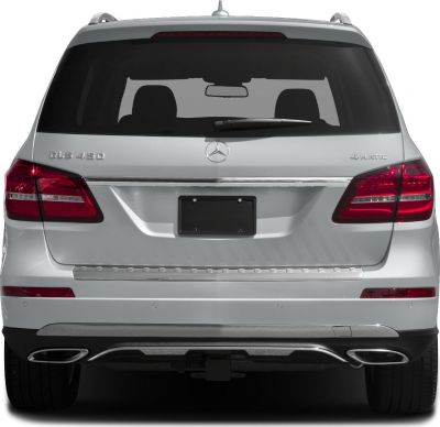 Rear view with tail lights, windshield wiper, dual exhaust outlets