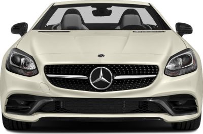 Front grille and headlights of a sports roadster with dual seats