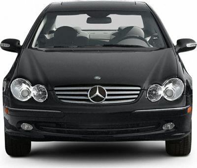 Front view with grille and dual round headlights