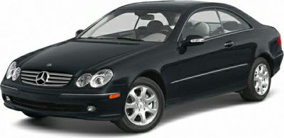 Black coupe with four round headlights and alloy wheels