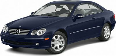 Two-door coupe with quad round headlights and sleek aerodynamic styling