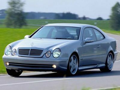 Quad circular headlights and sleek coupe body design