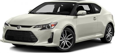 Sporty coupe front side with grille and alloy wheels