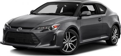Gray compact coupe with sleek headlights and alloy wheels
