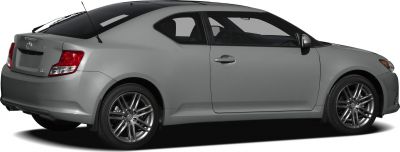 Side profile of sporty two-door coupe with alloy wheels and rear antenna
