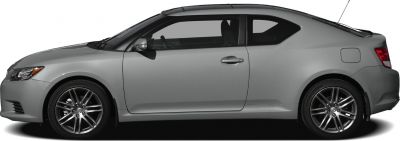 Side view of two-door coupe with alloy wheels and sleek profile