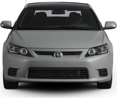 Front view with sporty headlights and wide grille design