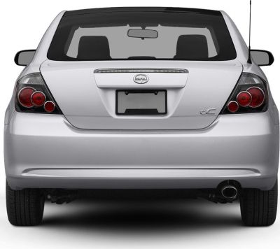 Rear hatch and circular tail lights of a facelifted hatchback model