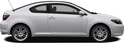 Side profile of a sporty two-door coupe with alloy wheels and tinted windows
