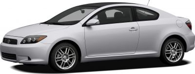 Silver sporty coupe with sleek side profile and alloy wheels