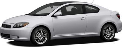 Side view of silver two-door coupe with alloy wheels