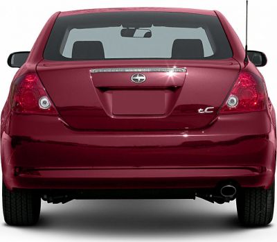 Rear view with signature tail lights and badge emblem