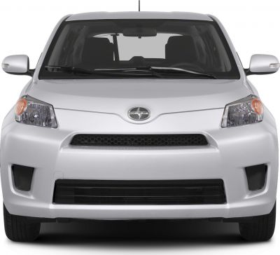 Front view with honeycomb grille and prominent headlights