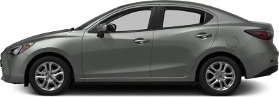 Side profile of compact sedan with alloy wheels and smooth body lines