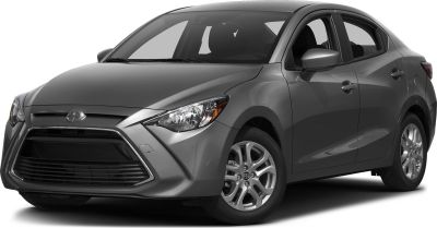 Front view of compact sedan with large grille and sleek headlights