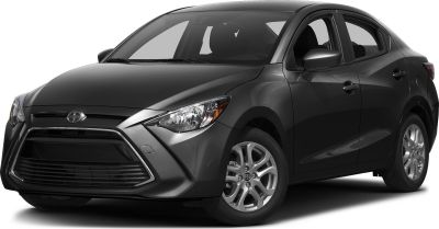 Front grille, headlight design, and alloy wheels of a compact sedan