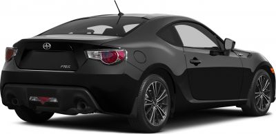 Rear side view of black sport coupe with distinctive tail lights and alloy wheels
