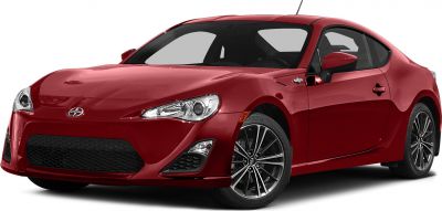Sporty coupe front-side with alloy wheels and sleek headlights