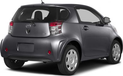 Rear side view of a compact hatchback with distinct rear lights and smooth curves.