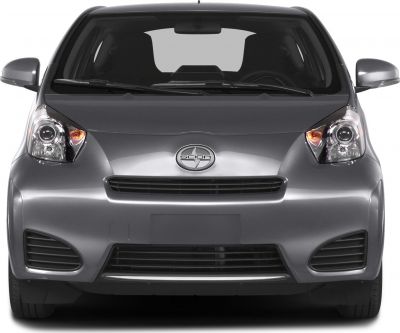 Compact car front view with headlights and grille in 2012 style