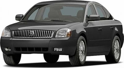Front grille and headlights of a black sedan