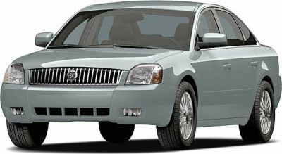 Front view with grille, headlights, and sedan body