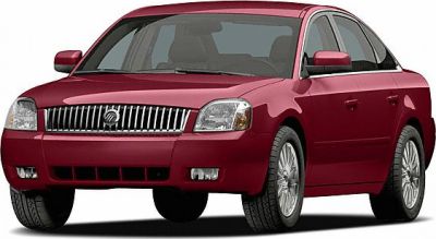Front view sedan with chrome grille and alloy wheels