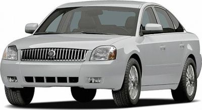 Front sedan view with grille and headlight focus
