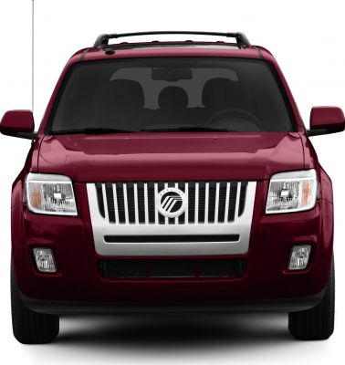 Front view with chrome grille and headlight setup