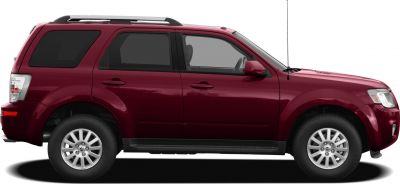 Side profile showing roof rails and multi-spoke alloy wheels