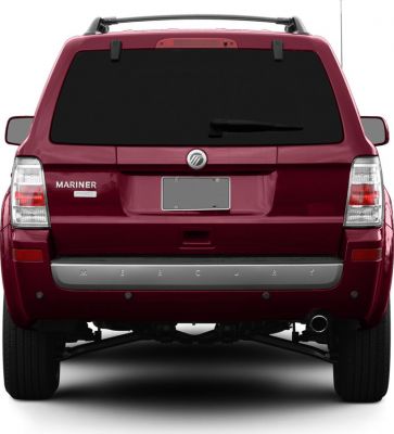 Rear view of an SUV showing tailgate, taillights, rear wiper, and exhaust tip