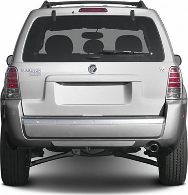 Rear view showing taillights, rear window wiper, bumper, and exhaust pipe.