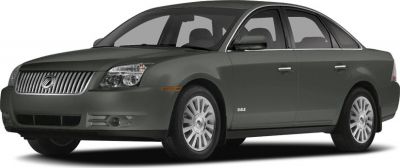 Front-side view of mid-size sedan with distinctive grille and alloy wheels
